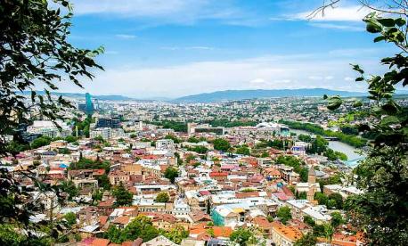 Scenic aerial beautiful view panorama of old historic city Tbilisi center, architecture buildings